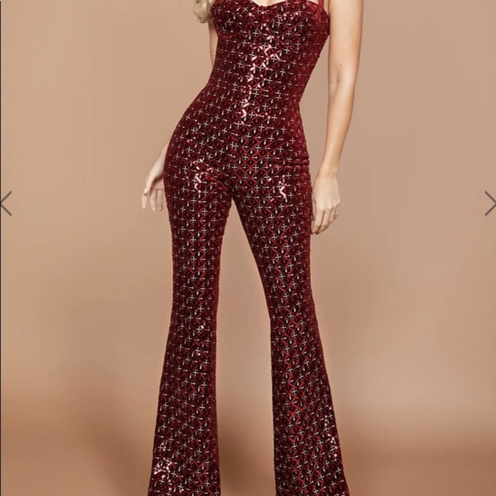 NADINE MERABI  HAILEY RED JUMPSUIT. SIZE S.